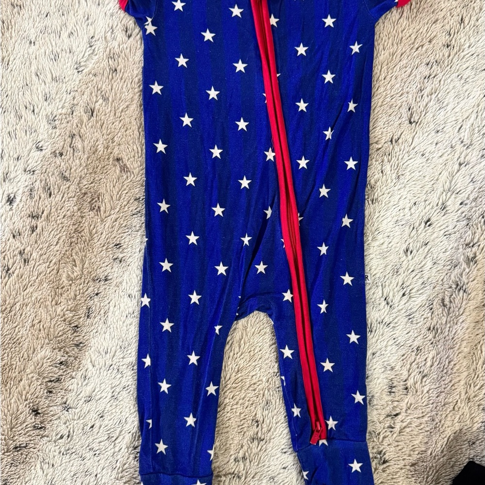 Vibrant Blue and Red Starry Footies One Piece
